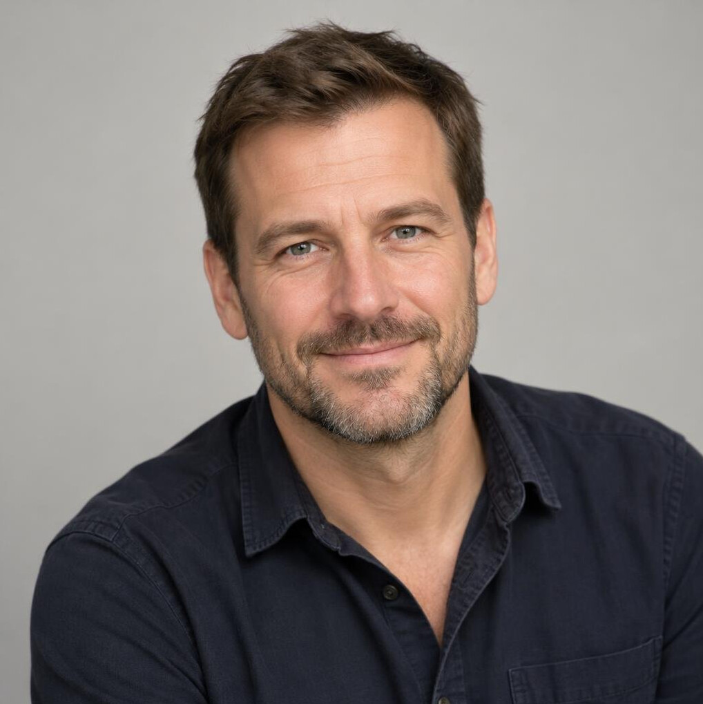 Portrait of a bearded man in a casual shirt